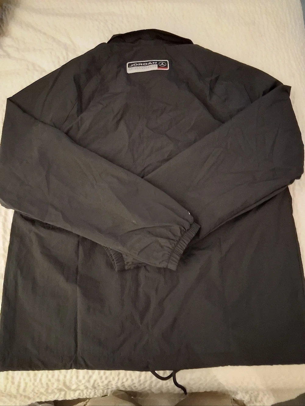 Jordan Men’s Black Windbreaker with Red 23 Patch